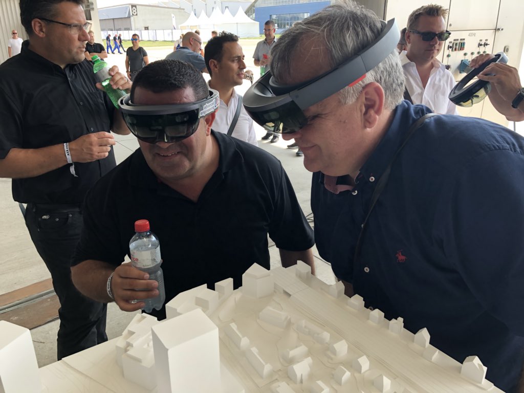 Lolo46822032's tweet photo. #AXACrashtests  a new #AR demo #FutureCity for @HoloLens and #ARKit - autonomous cars, drones, trains, people, all visualized based a virtual #Zurich model. About 100 customers tried out the newest technologies&amp; prevention messages. Thx @AXAnauten @lukaszimmerli and @sektorman https://t.co/ydTTrbrRfV