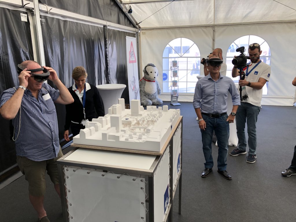 Lolo46822032's tweet photo. #AXACrashtests  a new #AR demo #FutureCity for @HoloLens and #ARKit - autonomous cars, drones, trains, people, all visualized based a virtual #Zurich model. About 100 customers tried out the newest technologies&amp; prevention messages. Thx @AXAnauten @lukaszimmerli and @sektorman https://t.co/ydTTrbrRfV