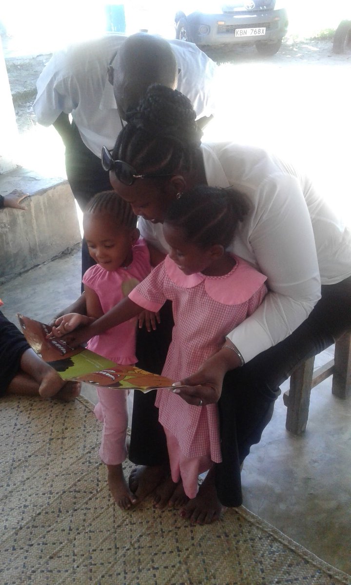 RosemaryMutunke's tweet photo. #Tbt Picture reading with two little girls in Kwale , promoting a reading culture through community libraries .@AKF_EA @YetuOrg @startalibrary #StoryForChela https://t.co/62IwuCZvIc