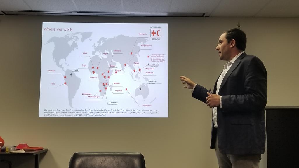 Shanna_McClain's tweet photo. Red Cross / NASA training day 2. @wxpizza explaining forecast-based financing and what hazard and vulnerability conditions create the need for early action. #RCNASA2018 https://t.co/uBBHB7Enep