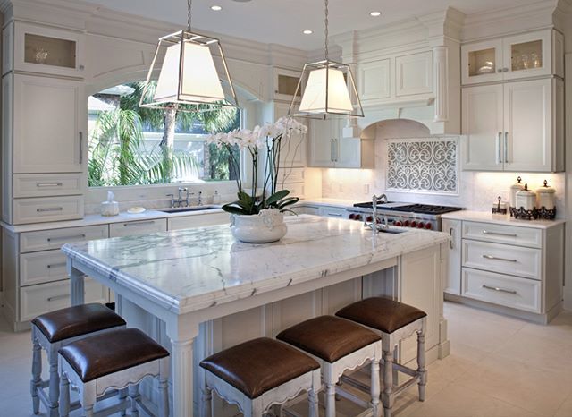 sefastoneusa's tweet photo. An incredible remodel example with white wooden cabinets, marble tops, a large window and beige floors. #marbletiles #marbledesign #interiordesign #designinspiration #marblecountertops https://t.co/HKWZXC8GwS https://t.co/5xQyugLh3y