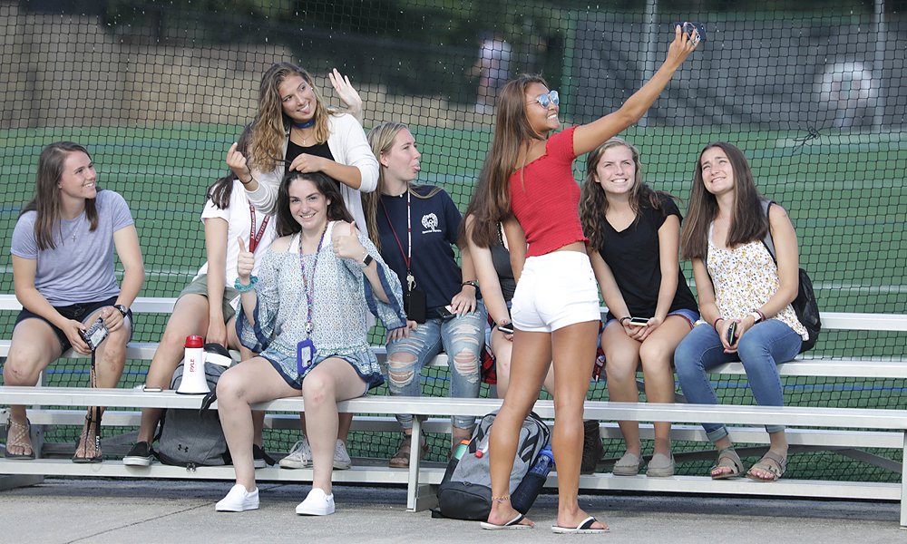 EUEagles's tweet photo. Welcome to @EasternU The Women's Soccer class of 2022 works on their selfie game while cheering on #EUFH at a preseason scrimmage. @EUWomensSoccer https://t.co/pkL6rFUx8U