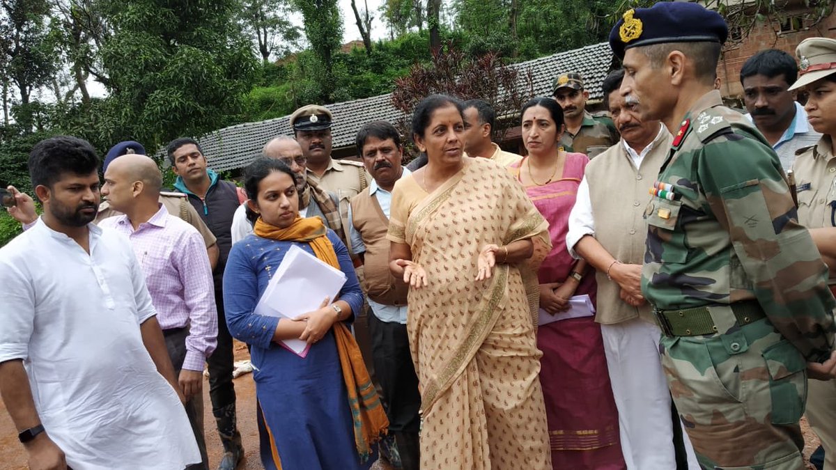 BJP4Karnataka's tweet photo. Defence Minister Smt. @nsitharaman visited Kodagu &amp; inspected the relief operations being carrying out by army. The central govt is committed towards rebuilding Kodagu &amp; stand with the people of the district. https://t.co/igOYVMAdsV