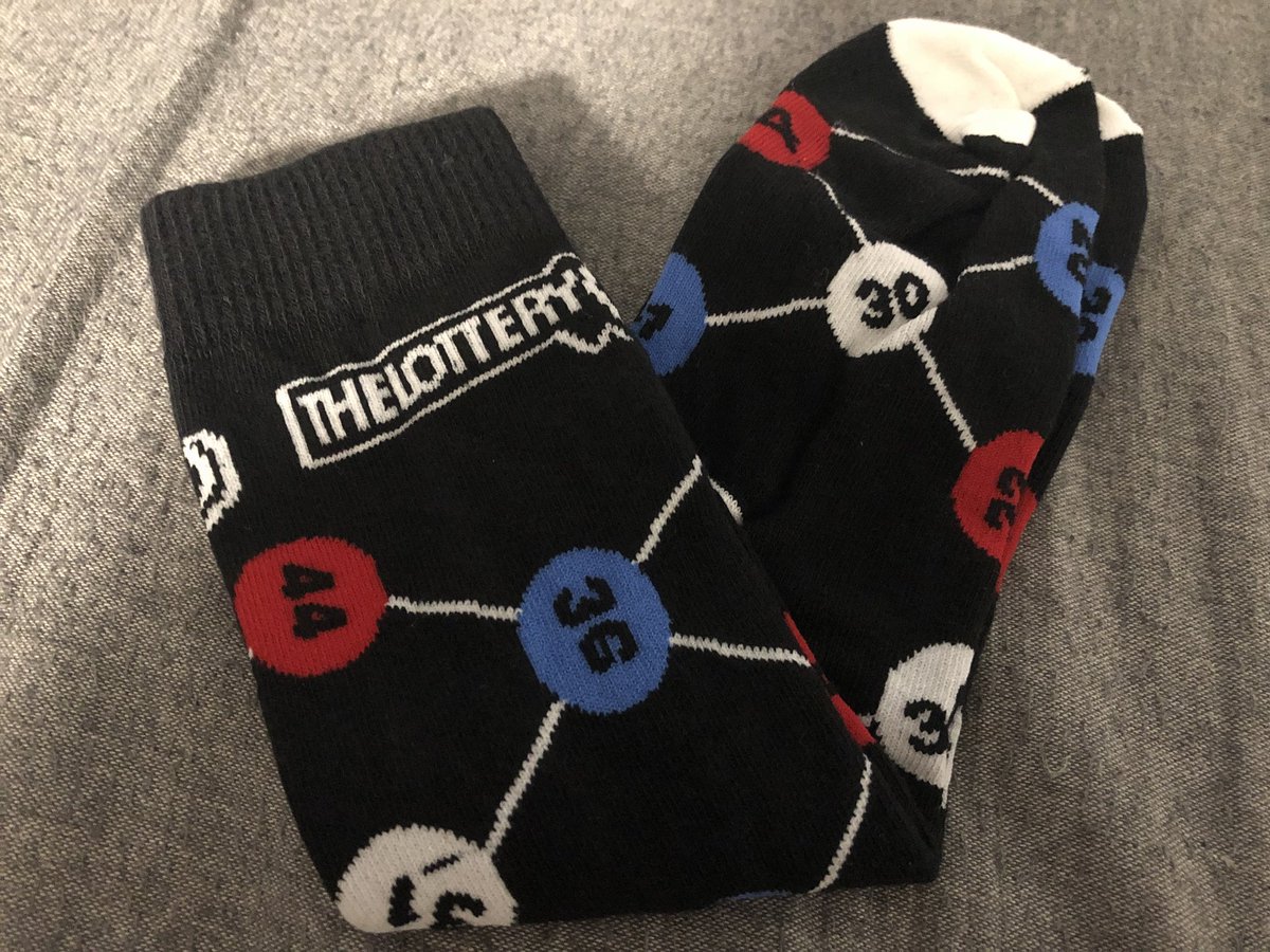 attackofthetext's tweet photo. Iβve been to a lot of startup booth events with swag in my day, and I gotta say these Mass Lotto Socks are boss. #BostonFest2018 https://t.co/vpMjhnsvSm