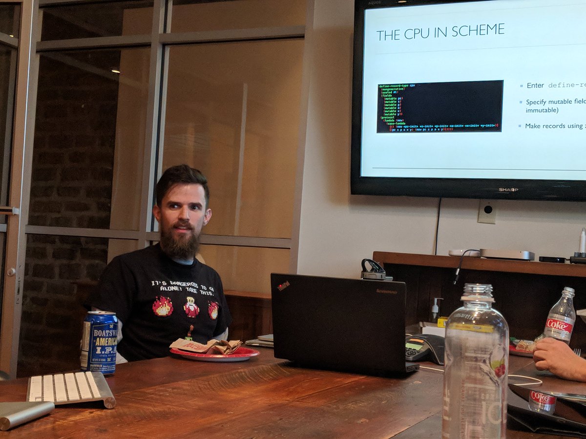 TriClojure's tweet image. We enjoyed "Functionally Old - Toward an Atari 2600 Emulator in Chez Scheme" by Chris Frisz yesterday evening. Thanks to @adzerk for hosting us and to @Deloitte for the🍕.