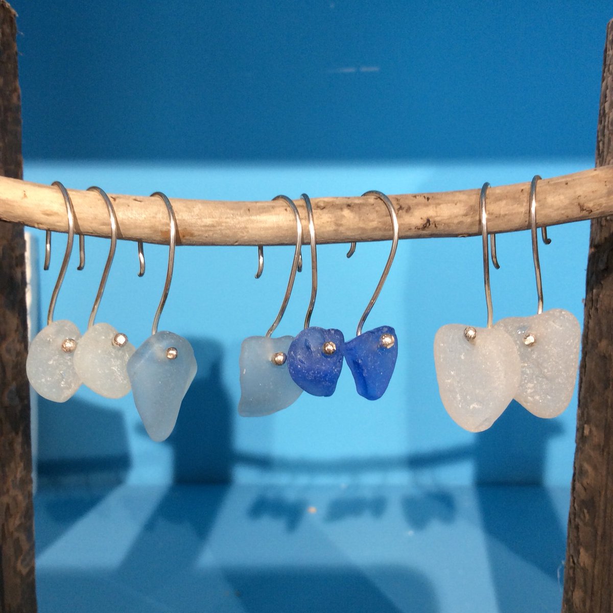 PhoenixScilly's tweet image. Gail’s lovely silver and sea glass earrings. A bit of #scilly #beach to own!
