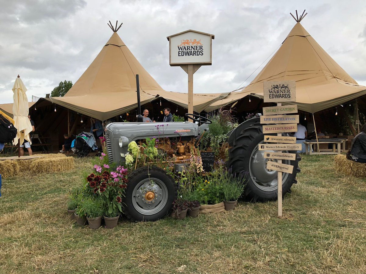 warnersgin's tweet photo. If you're @thebigfeastival this weekend, Gin Fans, make sure you pop by our epic #Gin Barn! Come and sample our range of multi-award winning Gins and relax with a G&amp;T! Its going to be an epic weekend 🙌 #WEFeastival #CraftedwithNature #TheBigFeastival #BankHolidayWeekend #FarmGin https://t.co/sFAkB5t4xl