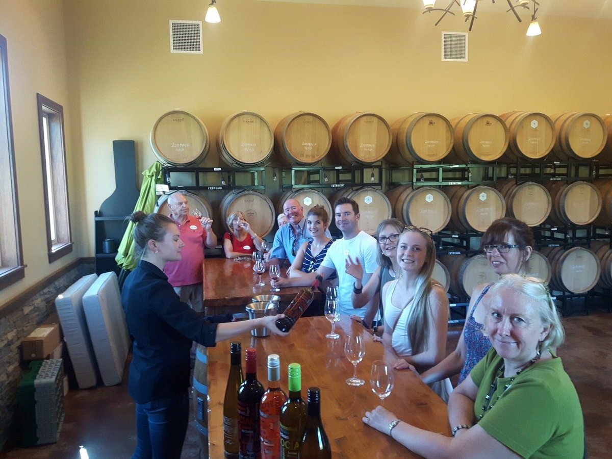 Guests enjoying some of the lovely wine at <a href="/intriguewines/">Intrigue Wines</a> #explorekelowna #sipkelowna