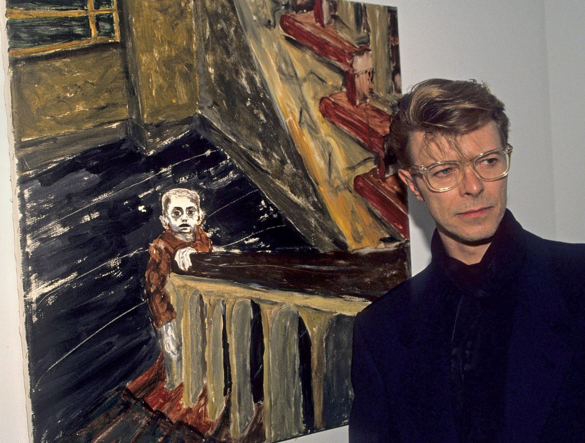 davidbowie_news's tweet photo. David Bowie and his paintings at Eduard Nakhamkin Fine Arts Gallery in New York City, November 1990, by Ron Galella. https://t.co/W3CXLwGJHa
