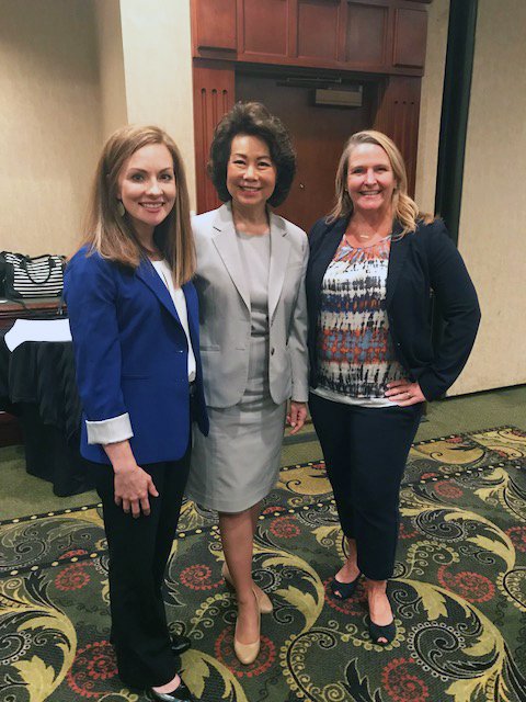 Lextran's tweet photo. Today at the @CommerceLex luncheon on Public Policy, @USDOT Secretary Elaine Chao announced that Lextran will be receiving a $2.3 million grant to expand our electric fleet in a new direction! These new @gilligllc buses will feature a longer range & overnight charging! #GoLextran https://t.co/jcI0aMZWzY