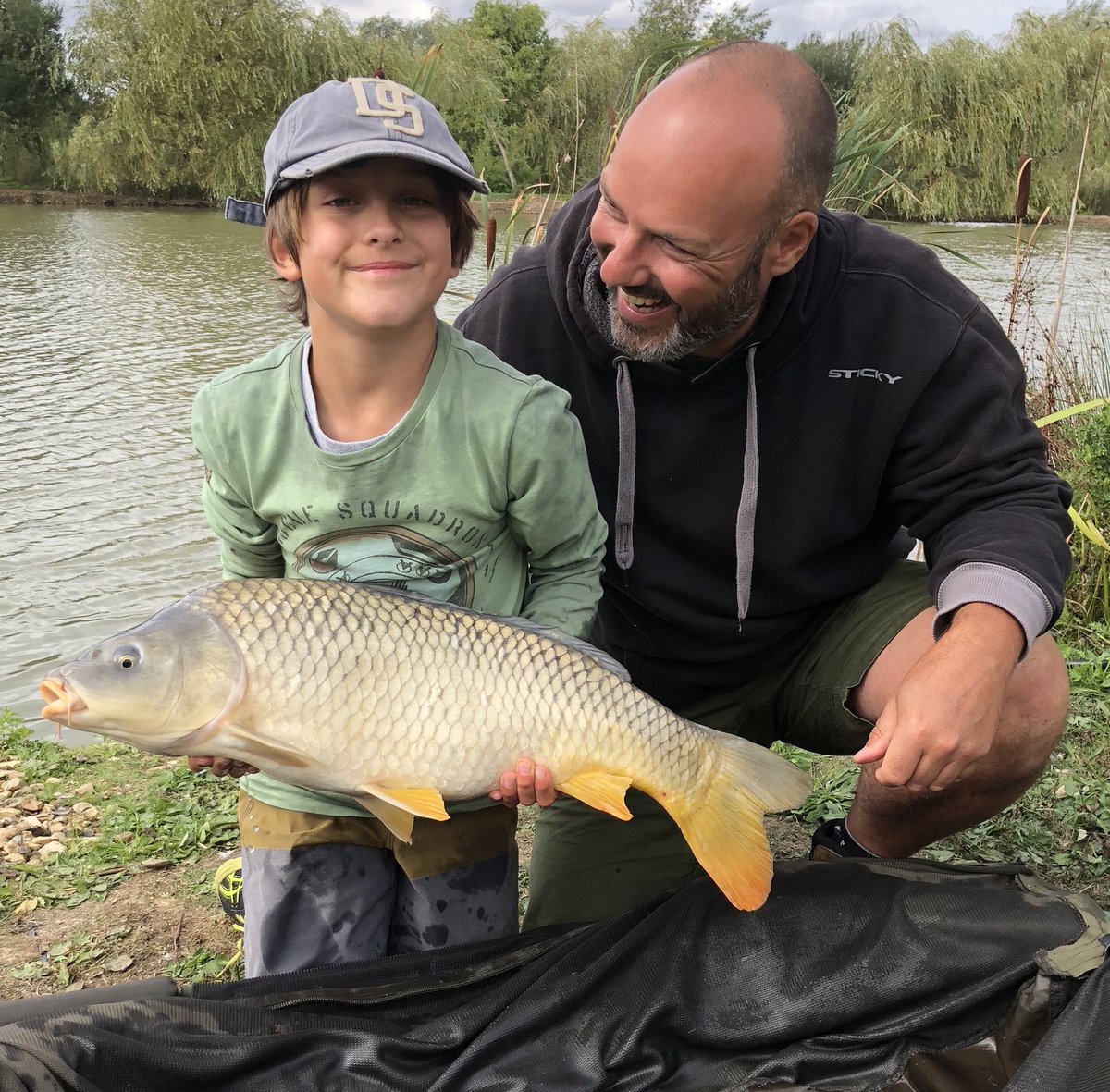 Adam_Penning's tweet photo. Spent the day with 10yr old Luca and his Dad, Nicholas. They bagged 13 carp in a fun packed day at Fryerning. Luca upped his best several times ending up with a 19lb whacker! I love my job, thanks guys!
#StickyManilla 
@askpenners https://t.co/p5Ug5cNeCa