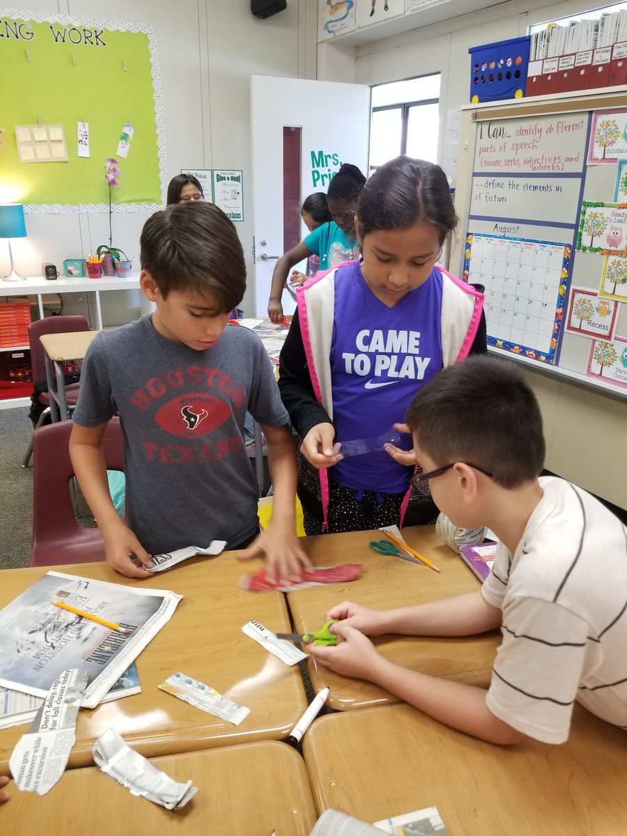 4th graders being innovators by making fashionable yet functional shoes out of newspaper. <a href="/HumbleISD_OE/">Oaks Elementary</a>