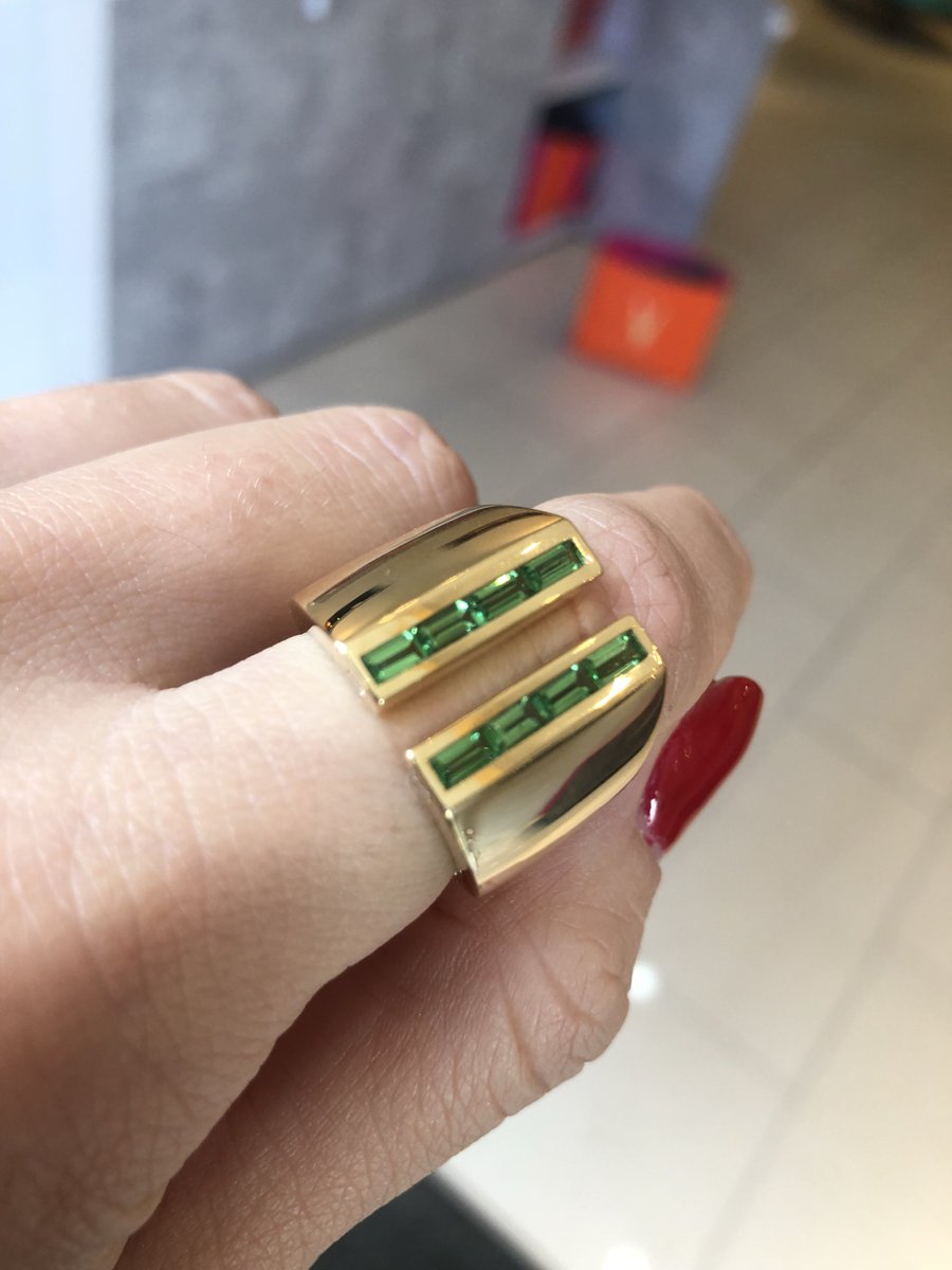 Sabre ring with tsavorites, available in pink sapphire and diamond.