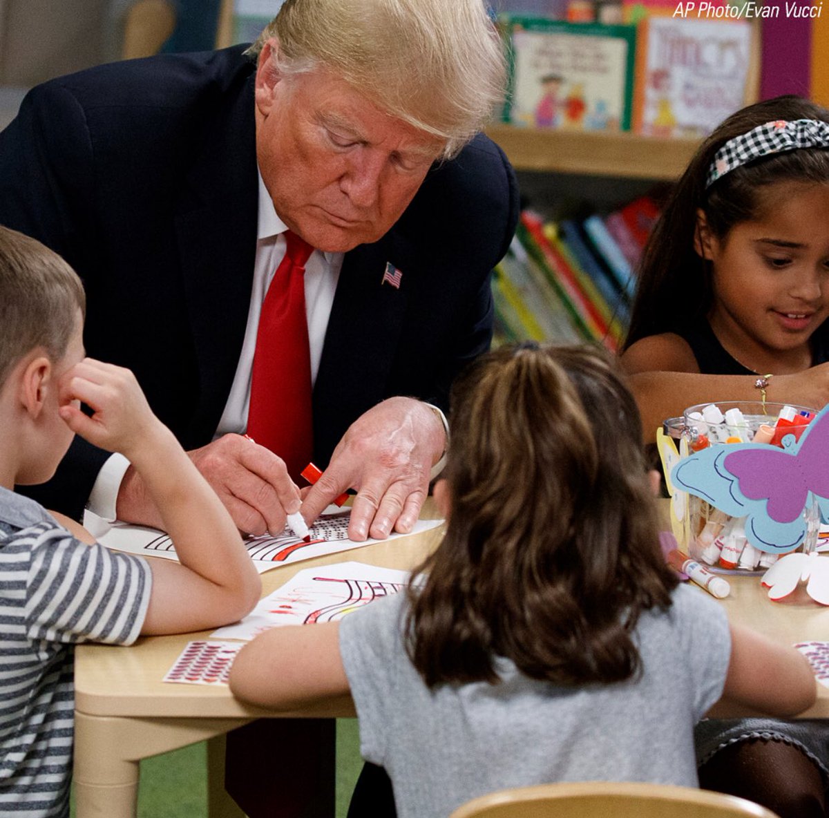 LauraLoomer's tweet photo. Love this picture of @realDonaldTrump coloring American flags with little kids. 

I love him. https://t.co/1kpGsKkjiI