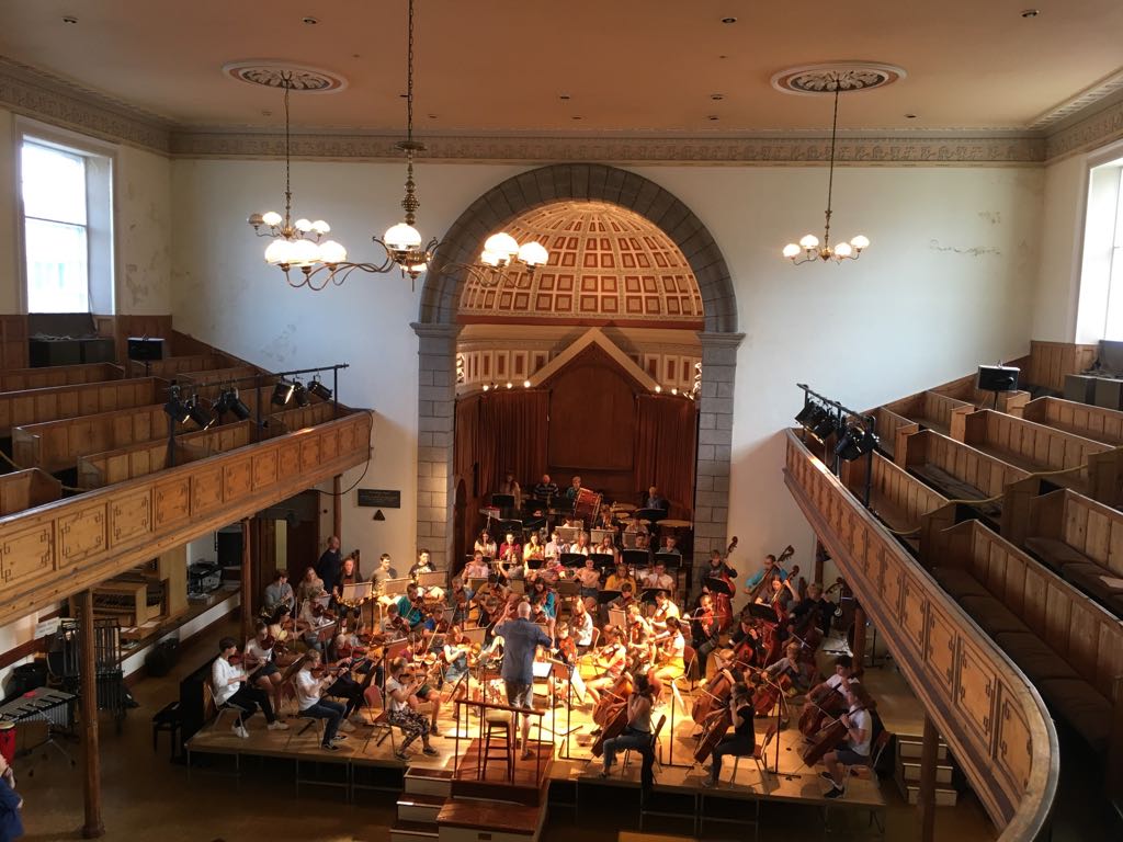 ECSOCGuernsey's tweet photo. Wow! What a #finalrehearsal
#congrats to everyone who has been involved in #ECSOC2018 ❤️
Tonight, 25th August features #IntermediateWinds #StringOrchestra and #SymphonyOrchestra
A pre concert talk with #AlexHarwood at 6.15pm @Eliz_Coll https://t.co/AES1hcNeLr