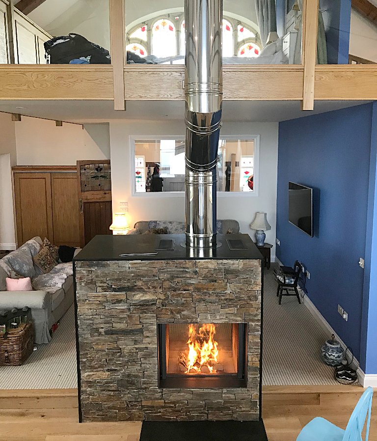 KernowFires's tweet photo. A dramatic double sided fireplace for a dramatic home, the Stuv 21 kicks out plenty of heat to warm this place and looks amazing!

#stuv https://t.co/eLKDk40RlX