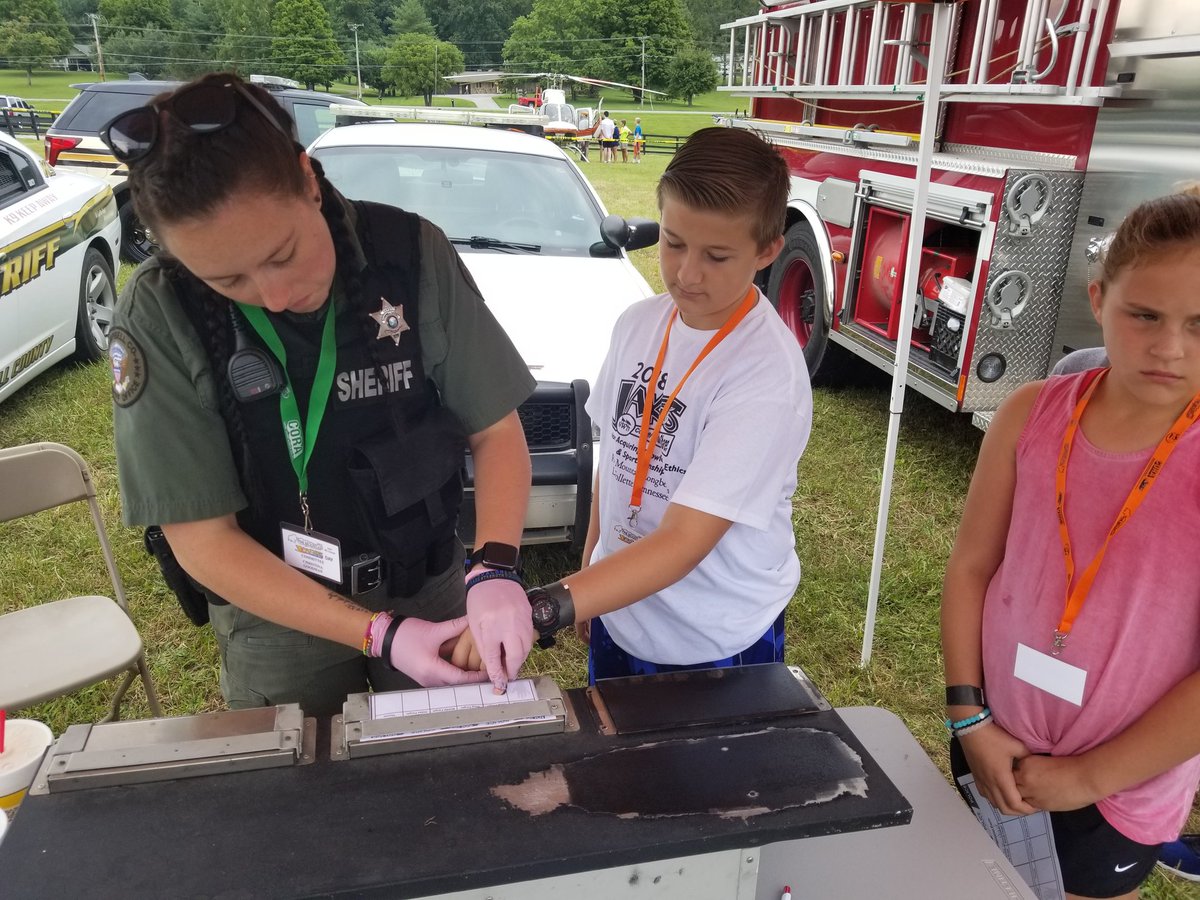 SRO Deputy Christina Goodman fingerprinting Dalton Brown at NWTF'e Jakes Day! <a href="/NWTF_official/">The National Wild Turkey Federation</a>
