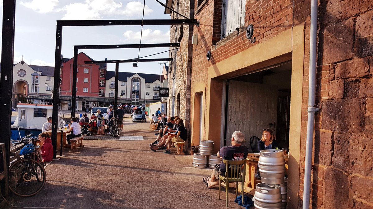 exeterhomebrew's tweet photo. Sun, fantastic #craftbeer and a lovely vibe for our friends @topshambrewery soft launch this avo. Tasty @PollyNostimos food too. Get down there! Can't wait to see the place when it's finished! A great addition to #Exeter quay 🍻 #devonfood #devon https://t.co/Hj21wY0geX