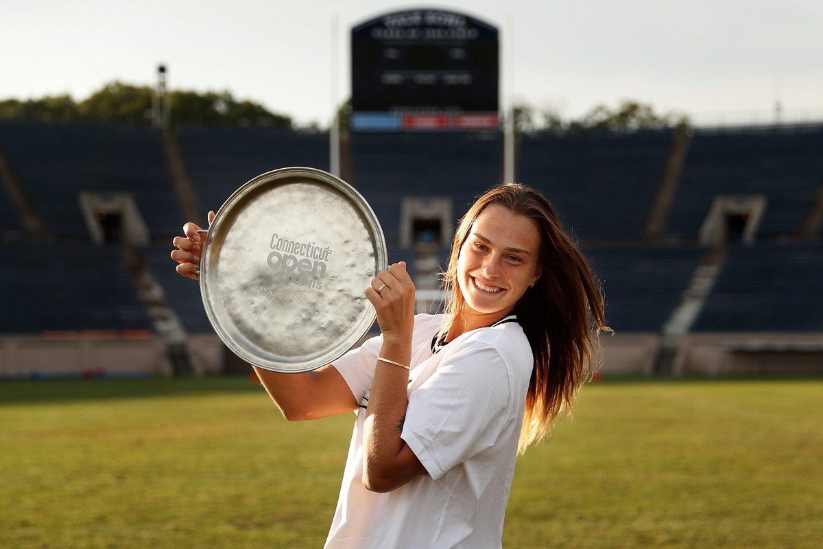 connecticutopen's tweet image. Bowled over: @SabalenkaA celebrates her first @WTA title at the iconic @Yale Bowl. 

📸 @WickPhoto