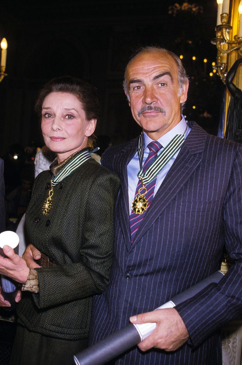 Happy Birthday, Sean Connery! Connery photographed with Audrey Hepburn at a Paris awards show, 1987 