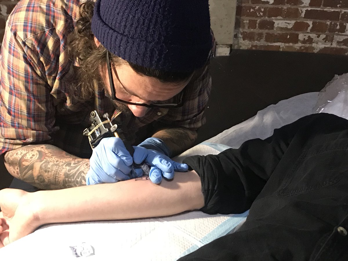 jadancarroll's tweet image. Did not have to think very hard about whether or not to get a tattoo with @MARIADAHVANA at @MelbWritersFest. She got a dragon, I got a dog. #authorcare #MWF18