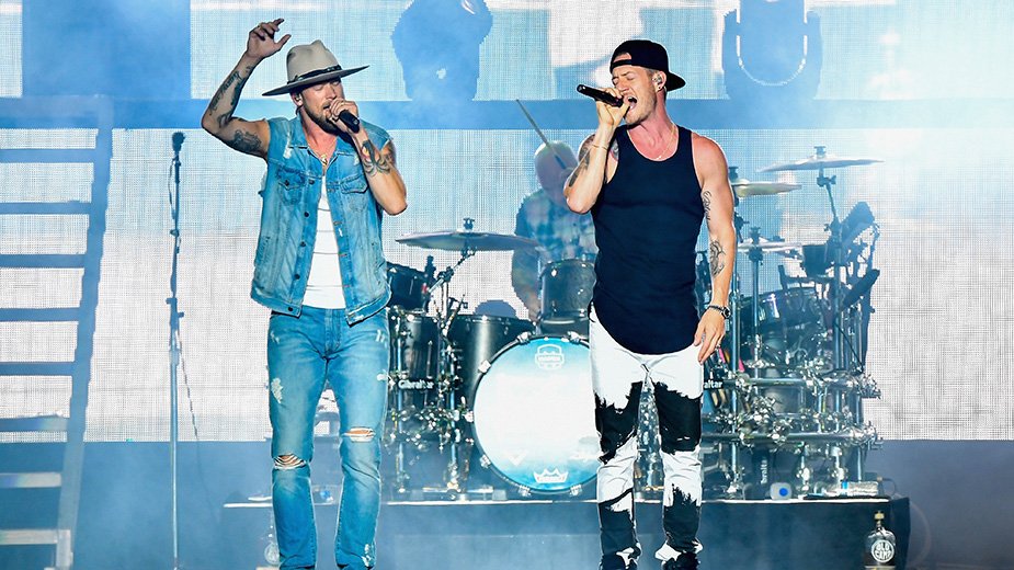 CMT's tweet photo. Listen up: @FLAGALine just dropped their new single “Sittin’ Pretty.” Tell us what you think > https://t.co/i705SHQHo6 

**Brian Kelley sings lead on it! https://t.co/PBoXRpdTph