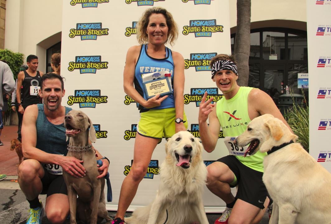 themile's tweet photo. Today is #NationalDogDay! Four paws up, way, way up!! 🐾🐾

BTW, the dog on the left, Kaydom &amp; his owner Brian Duff have recorded the fastest documented owner / dog time for the Mile, 4:13, at the 2016 State Street Mile in #SantaBarbara! 😮 #SuperPooch 🐕 https://t.co/PfLKErdNGv https://t.co/1CUIaKRaAy