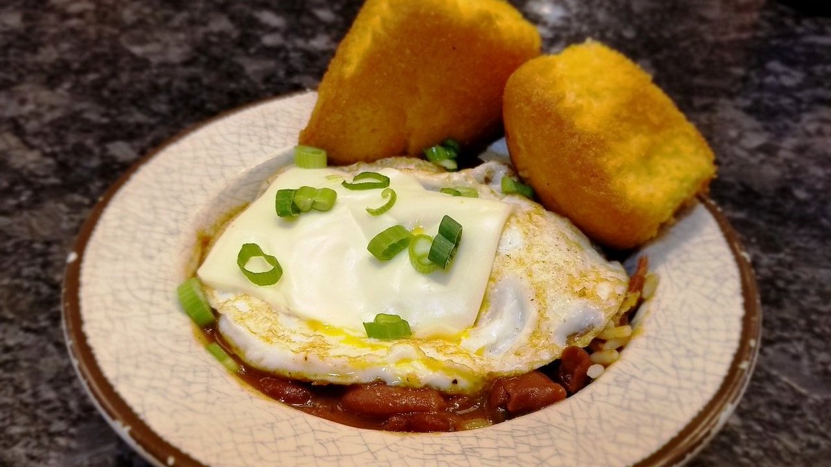 The Breakfast Trifecta! Red Beans, Fried Egg & cheese over white rice & grilled cornbread. Get Beck's Bourbon Street Breakfast! #Philly #NewOrleans #PhillyFoodies #ChefApproved