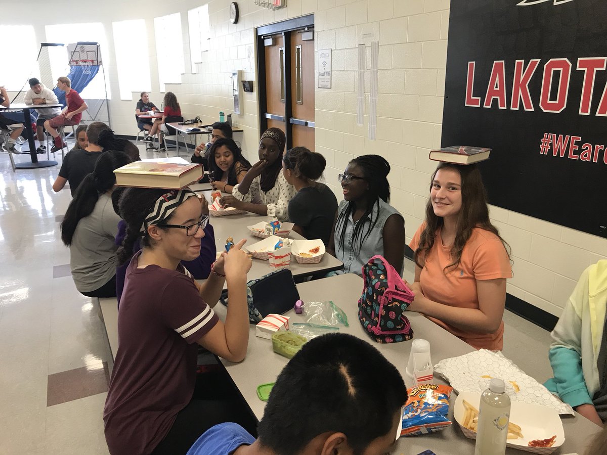 LakotaRidgeJR's tweet photo. The “balance book on head challenge” happened at lunch today. 😁#JRHighLife https://t.co/ET6110hRz9