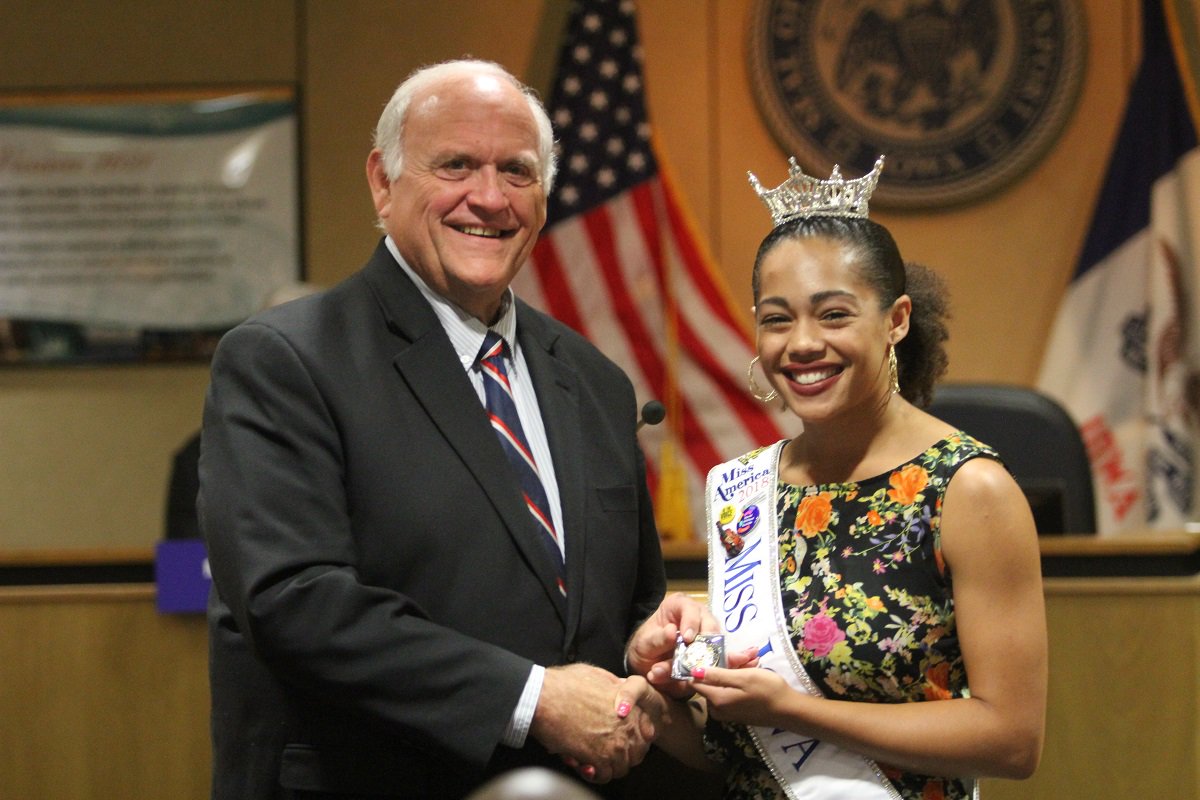cityofdavenport's tweet photo. Good luck to @MissIowaOrg Mikhayla Hughes-Shaw as she prepares to head to the Miss America competition that starts Sept. 9! She stopped by a recent City Council meeting where Mayor Frank Klipsch gave her a challenge coin. https://t.co/7wSj5rdmjf