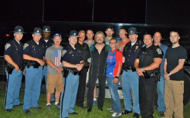 While assisting with security at the Swiss Wine Festival in Vevay, IN, <a href="/ExcisePolice/">Indiana State Excise Police</a> officers, <a href="/IndStatePolice/">Indiana State Police</a> &amp; Vevay Police had the opportunity to meet and take a quick photo with @Travistritt last weekend. Thanks, Travis!
