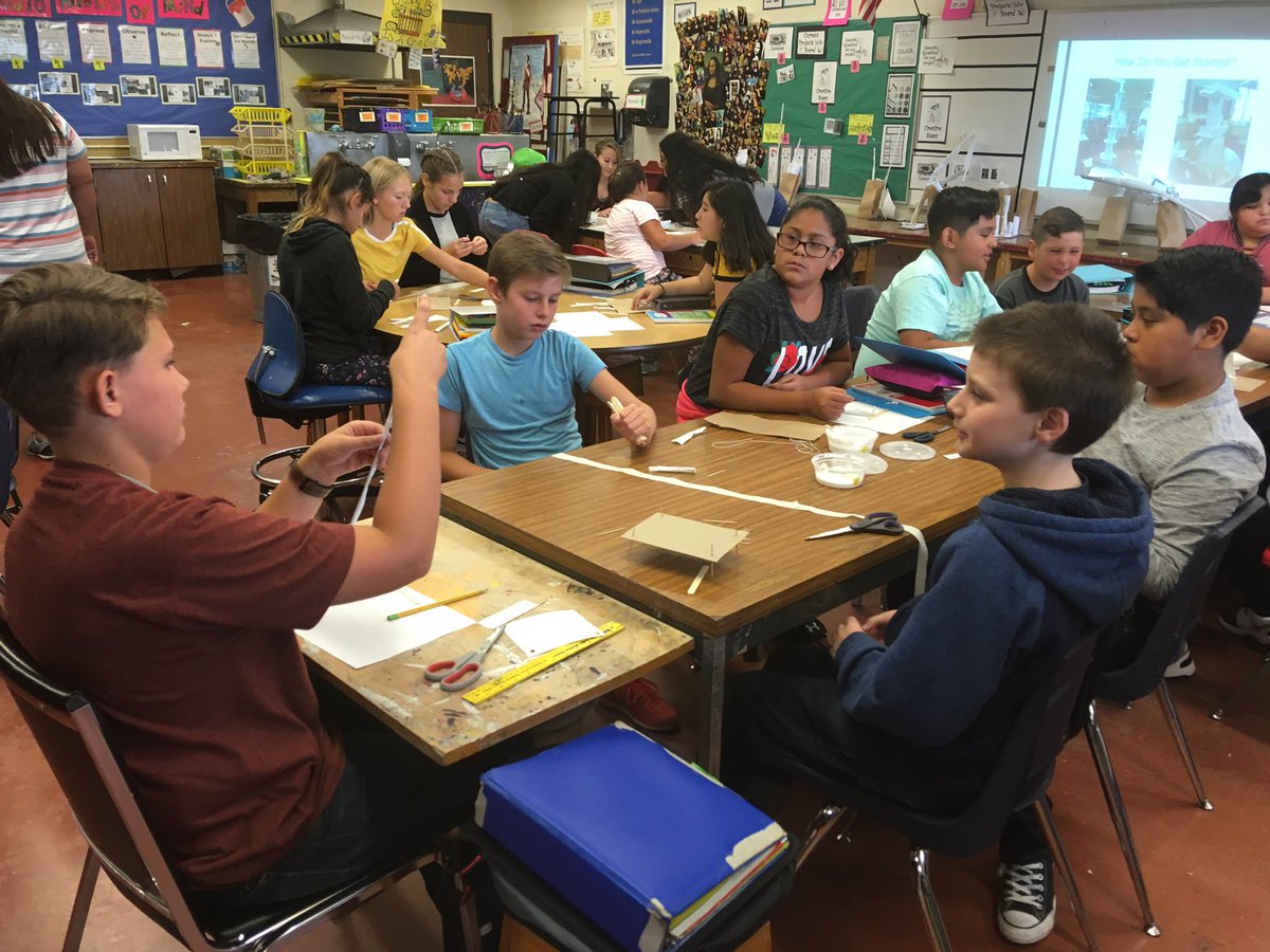 1st day we built towers!groups built tallest 1 using 5 papers, a yard of string, 10 popsicle sticks, 10 toothpicks, 2 yards of masking tape