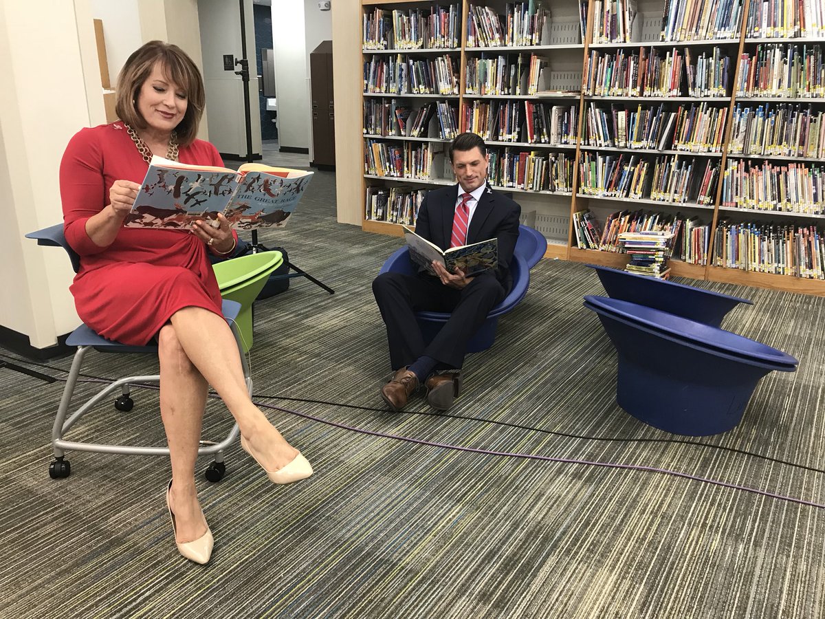 KarenLarsenKJRH's tweet photo. Who can resist exploring a library? This one’s beautiful! Thank you to @TulsaSchools for letting us broadcast live from Emerson Elementary tonight. @BrianKJRH @KJRH2HD #ProjectSafeSchools https://t.co/gHdOPJwUkA