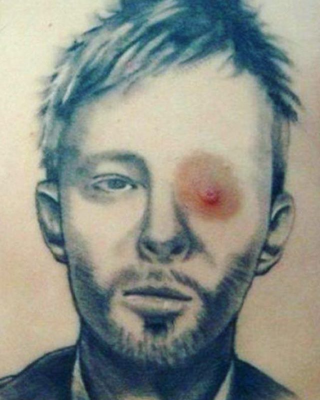 suicideslomo's tweet photo. Don’t know if the best or weirdest tattoo on the planet #tattoo #musician #awesome #artist #kida #radiohead #frymeme #wondering #confused #thom #yorke #badass https://t.co/hYhbrOShkd