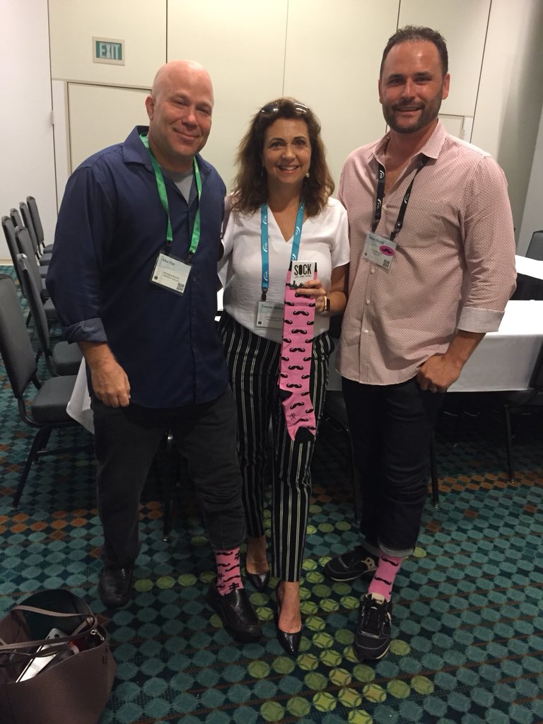 alexbfair's tweet photo. Inducting @cbweisman of @PlugandPlayTC into #PinkSocks tribe with @mikebiselli at @StephenKonya s event at #HealthFurther18 https://t.co/SdXv1ZG25u