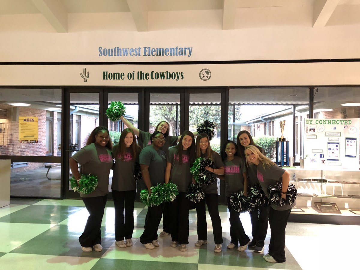 GCSchoolsNC's tweet photo. Thanks to the @SouthWestGHS cheerleaders for helping @SWES_GCS students and families kick off the first day of school yesterday! #GCSFirstDay2018 https://t.co/cQ4FC9QiOK