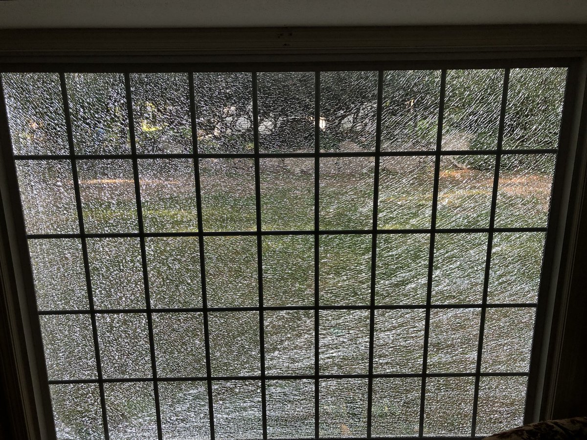 kstambaugh's tweet photo. Heard a bang and didn’t know what it was.  Later on figured out it was the huge window in the living room shattering.  Ugh. https://t.co/aQGWDMRnJU