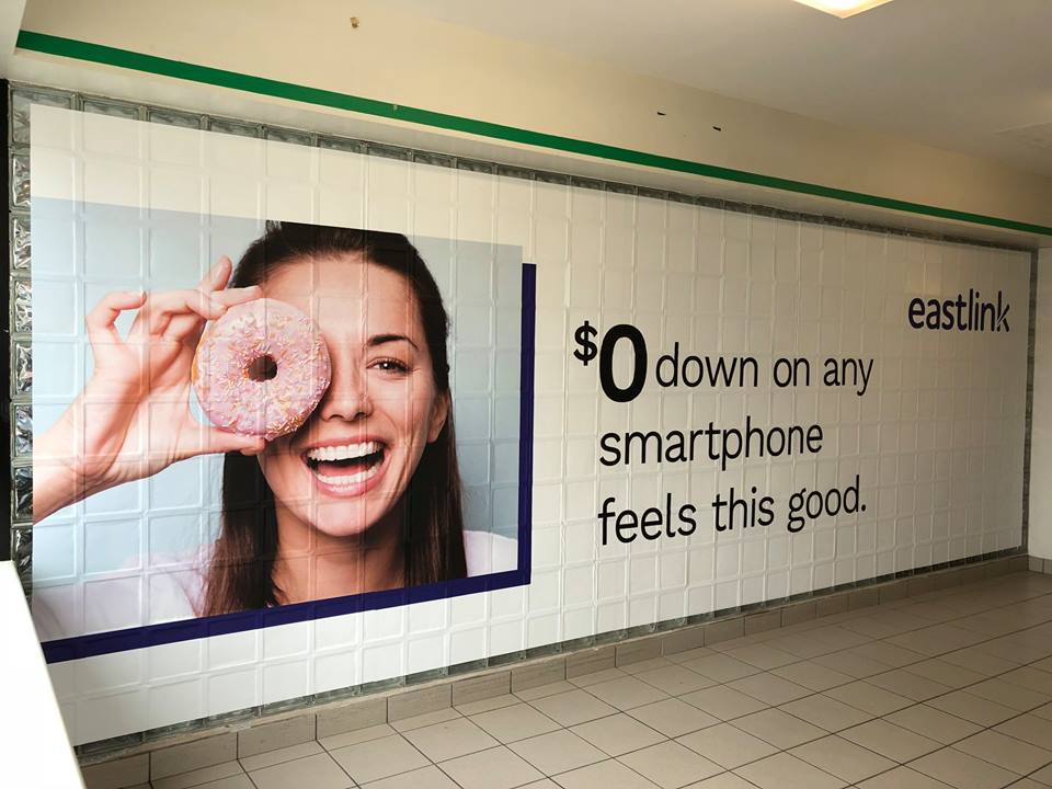 SpeedproNL's tweet image. Murals are an effective way to transform blank walls with great advertising - and this one was installed at the university just in time for back to school!