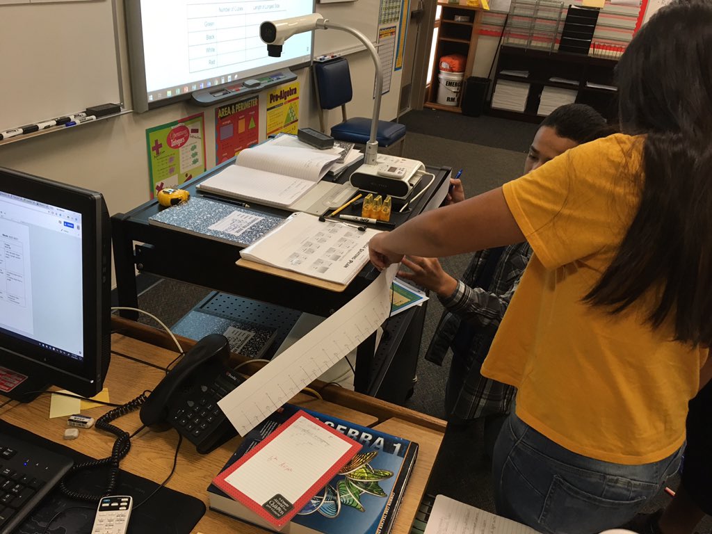 WittmansWorld's tweet photo. Teamwork and collaboration using their handmade rulers to measure. #ChipmanMath https://t.co/TA10DwvKdD