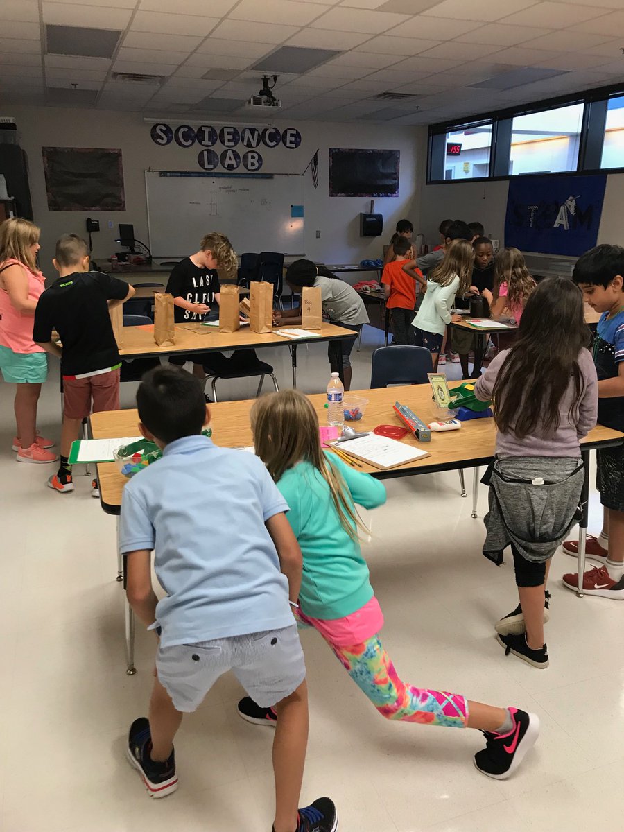 CharlesmMary's tweet photo. 3rd grade investigating physical properties of matter.⁦@ElliottLearners⁩ https://t.co/9fYEW96TDU