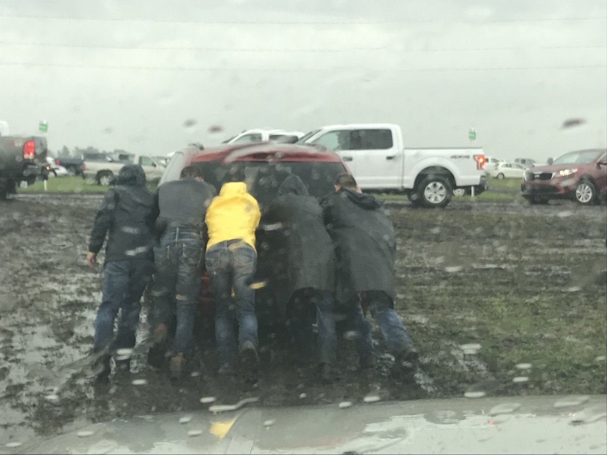 Proud of these guys. Voluntarily stood out in the rain and pushed cars that got stuck leaving the farm progress show. When they got back, the first words they said were “that was fun!” #livingtoserve