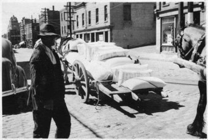 Horse-drawn cart loaded with sacks, c. 1939. Photo by Gustav Anderson.