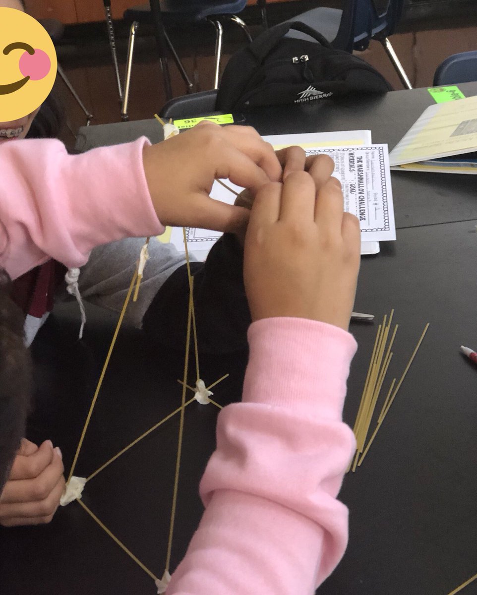 On the second day of school, students dived into the collaborative spaghetti #marshmallowchallenge to build, test and iterate #teambuilding #iterative process #design cycle #fun