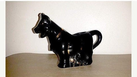JunkYardBlonde's tweet photo. Vintage Black Cow Creamer,Cow Creamer,Creamer Pitcher,Cow Creamer,Farm Decor,Country Kitchen,Cottage Living,Gold Gilt,Black,Gold,MCM,1960s https://t.co/TqYlCACsEk #housewares #serving #black #ceramic #cowcreamer #countrykitchen #farmdecor #farmanimal #creamerpitcher https://t.co/7PIbTUzR1S