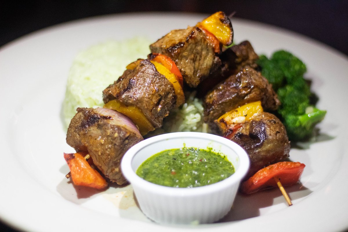 Don't make a misteak and miss out on our special of the week! Grilled Steak Kebabs with peppers &amp; onions served over cilantro rice and chimuchurri sauce!