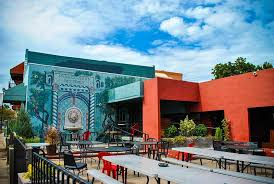 HIEBricktown's tweet photo. @VisitOKC A4. @PaseoOKC is a gem, full of vibrant colors and art work ready to be explored! #SeeOKC https://t.co/ruRkEcfpeK