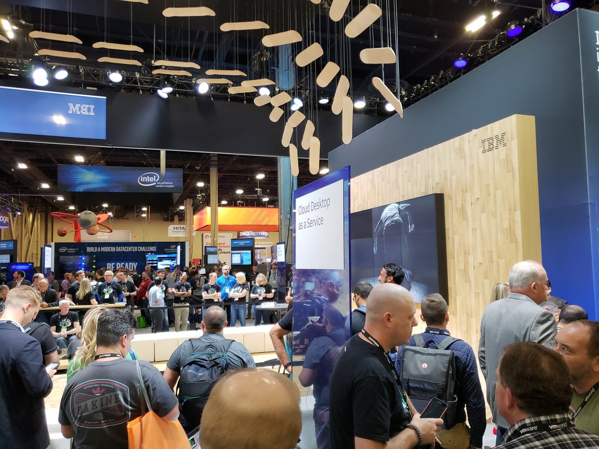 timmvt's tweet photo. Line for the legend, #TonyHawk and master #RodneyMullen at #VMworld2018 wraps around entire display https://t.co/6zp1goF36k
