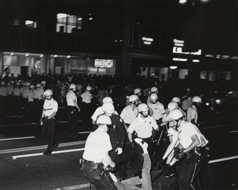 8. The dark, blurry, TV-camera lit footage was shocking. It showed police wailing on everyone and anything with flying nightsticks and occasionally their fists. No sooner had they finished clubbing a protester or journalist when the next posse ran into the throng, swinging.