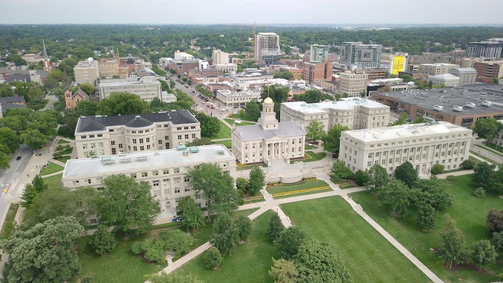 uiowa's tweet photo. The University of Iowa and #IowaCity go together like (insert your favorite combination here). 🖤💛 https://t.co/gLLHPCRCfC