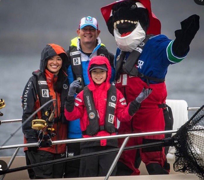 CanucksFIN's tweet photo. Whale time to kick up the feet and relax after a successful #FFK2018 Derby. My new pal Andrew and his family welcomed me onto their boat and we had a FINtastic time! @Fishing4Kids @fishWCFC @canucksautism #TightLines #Salmon https://t.co/qd5yWXWUHq